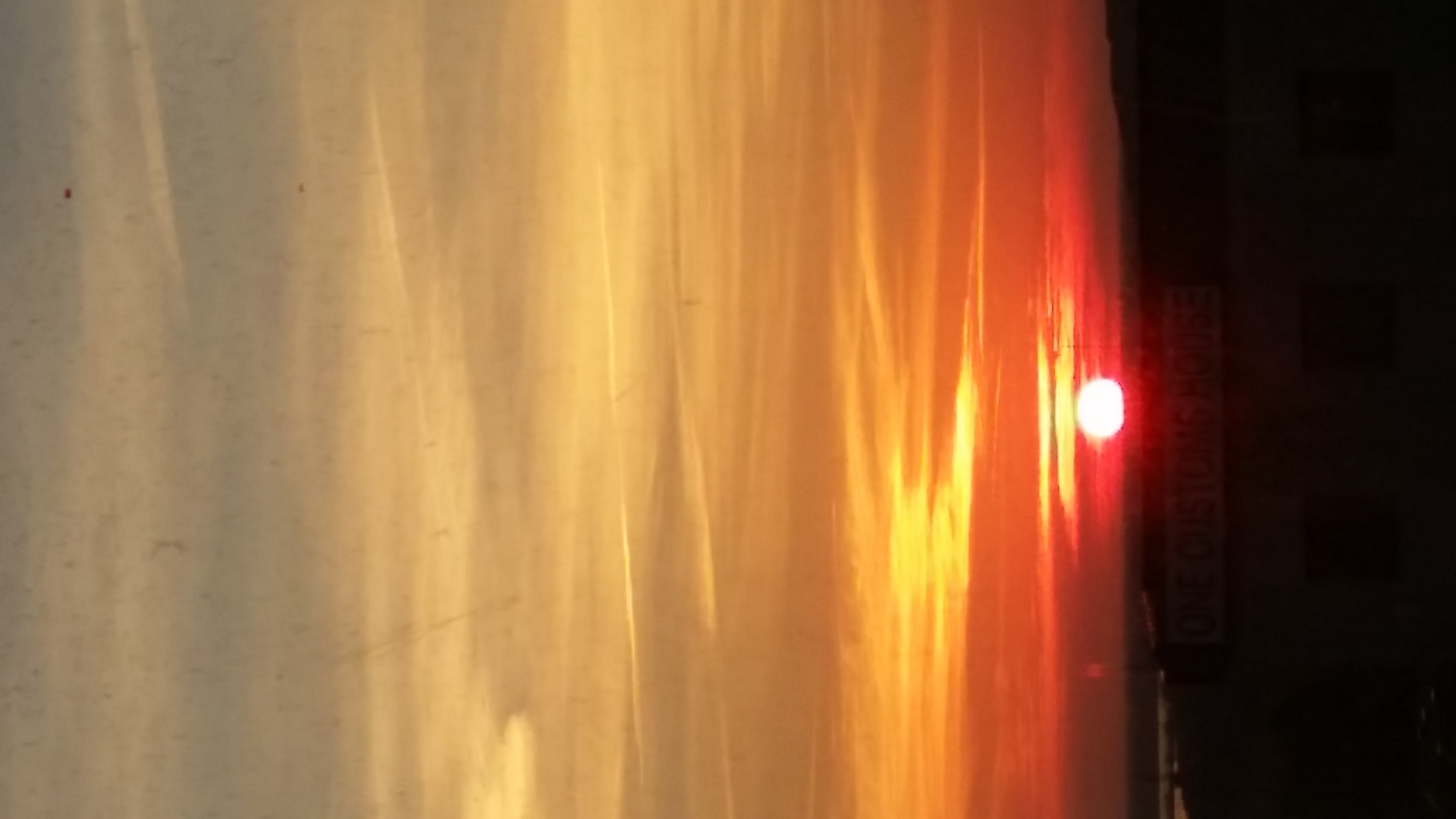 A bright sun low in a golden and red sky